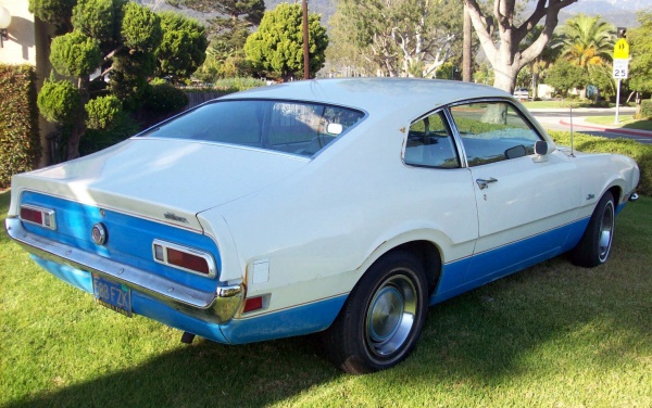 Red white and blue ford maverick #7